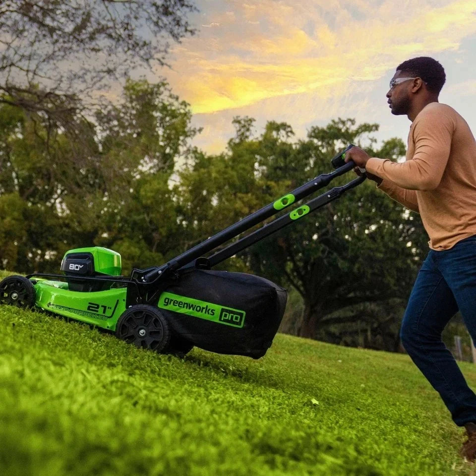 Greenworks 80V 21” Lawn Mower, 13” String Trimmer, and 730 Leaf Blowers. image 2